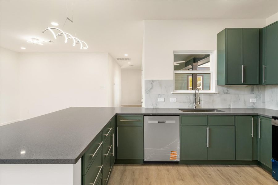 Ample cabinet and counter space make this kitchen as functional as it is stylish.