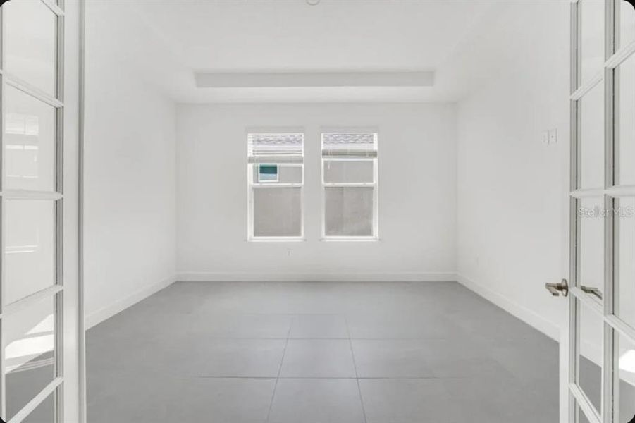 Spacious, unfurnished interior of a new home in Harvest at Ovation, Winter Garden (Image 8).