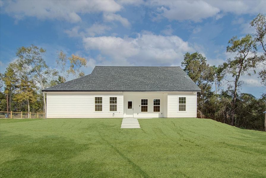 Front exterior of a new home in , Cleveland, TX, highlighting curb appeal (Image 2). Front exterior of a new home in , Cleveland, TX, highlighting curb appeal (Image 2).