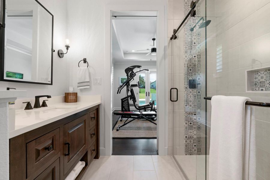 Bedroom # 3 ensuite bath features designer touches and glass walk-in shower. Large closet and dressing area not shown. Bedroom # 3 ensuite bath features designer touches and glass walk-in shower. Large closet and dressing area not shown.