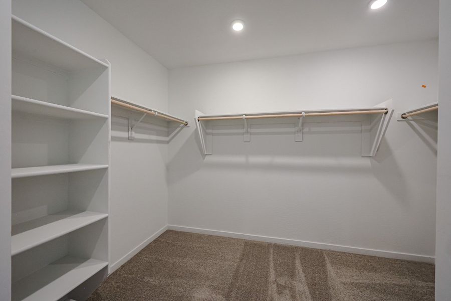 A white room with shelves. A white room with shelves.