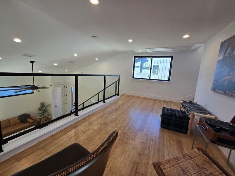 Glass on the railing, so you can set up seating upstairs for social gatherings and TV watching! (Superbowl party?) Glass on the railing, so you can set up seating upstairs for social gatherings and TV watching! (Superbowl party?)