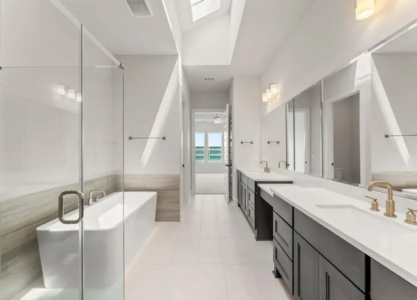 Primary Bath with Skylight, Double Sinks, and Built-in Make-up Vanity Primary Bath with Skylight, Double Sinks, and Built-in Make-up Vanity