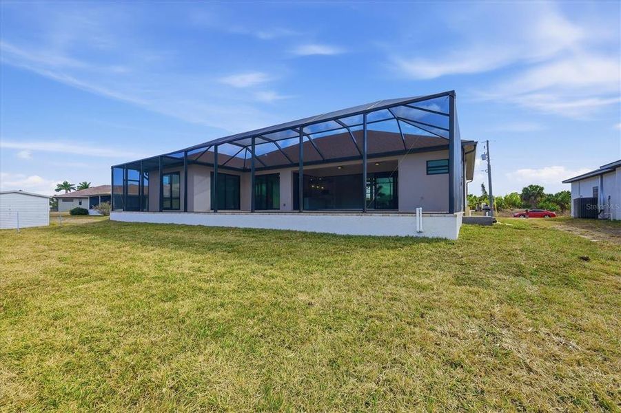 Exterior details and patio area of a home in , Port Charlotte (Image 22).