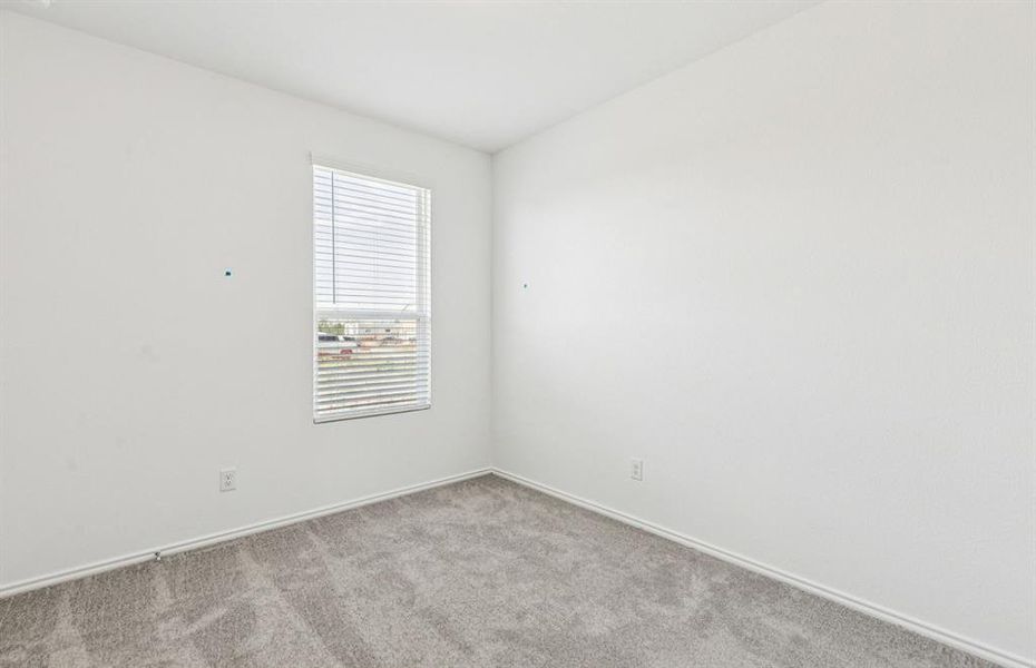 Spacious secondary bedroom with large windows *real home pictured Spacious secondary bedroom with large windows *real home pictured