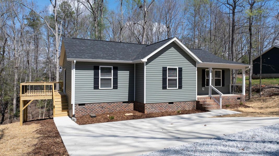 Exterior details and patio area of a home in , Valdese (Image 14).