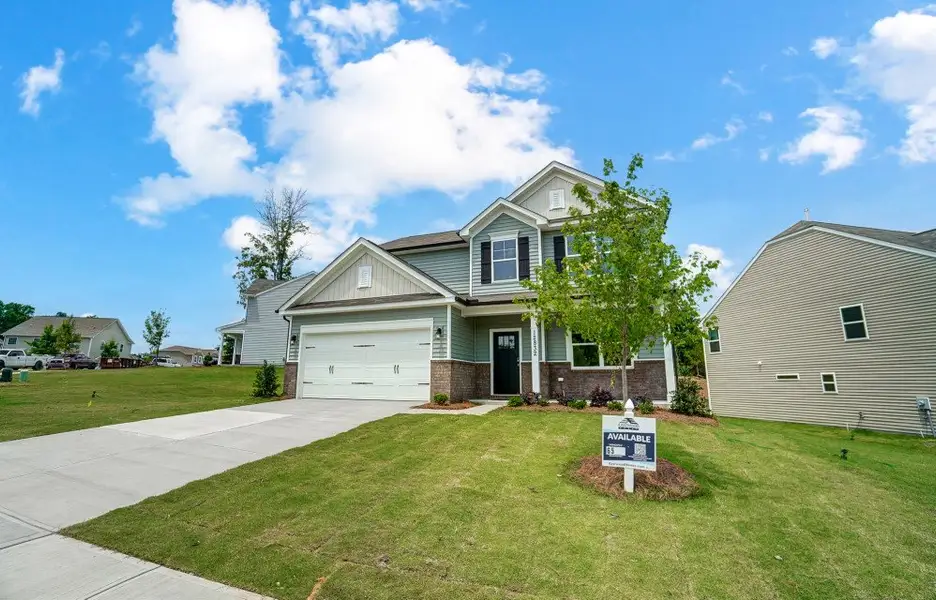 Representative exterior photo of a completed home built from the Newberry by Eastwood Homes in Secrest Meadows, Monroe, NC (Image 2).