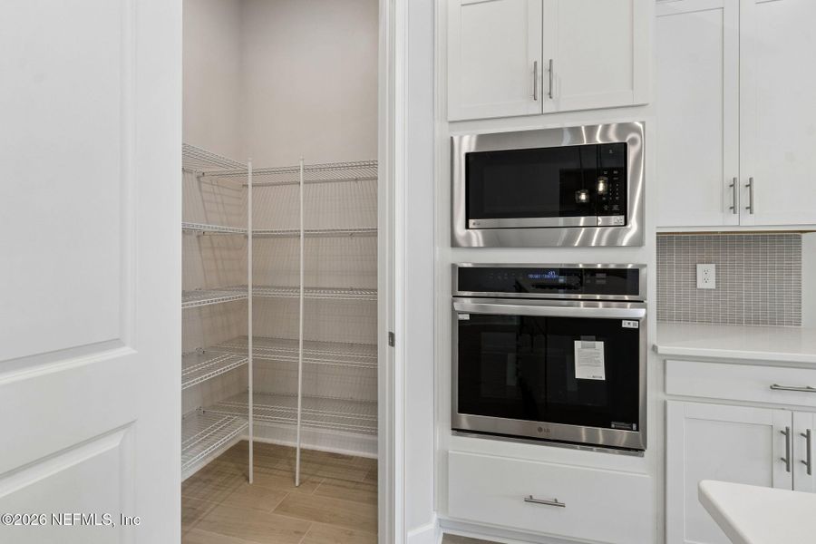 Furnished interior view inside a new home in Sandy Ridge, Yulee (Image 6).