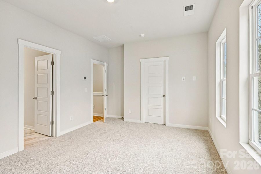 Spacious, unfurnished interior of a new home in Vanguard at Vermillion, Huntersville (Image 9). Spacious, unfurnished interior of a new home in Vanguard at Vermillion, Huntersville (Image 9).