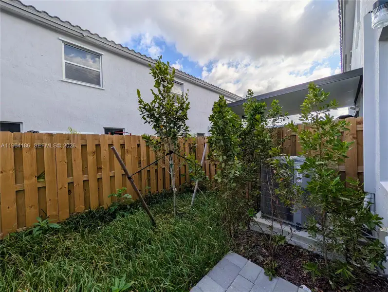 Exterior details and patio area of a home in , Florida City (Image 4).