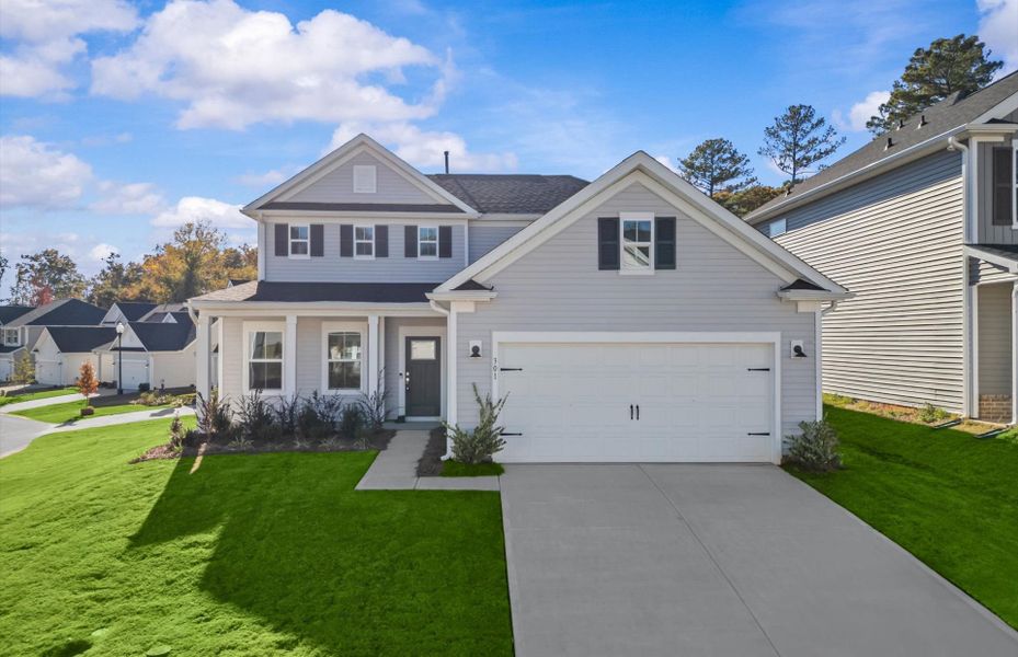 Front exterior of a new home in Indigo Park, Easley, SC, highlighting curb appeal (Image 21).