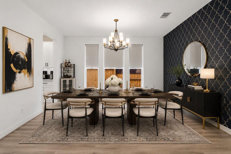 What a great space for you and your guests to dine in style for special occasions, big family gatherings or holidays! Featuring a custom wall, upgraded chandelier for lighting, and an abundance of natural light. ceilings. *This photo has been virtually staged.