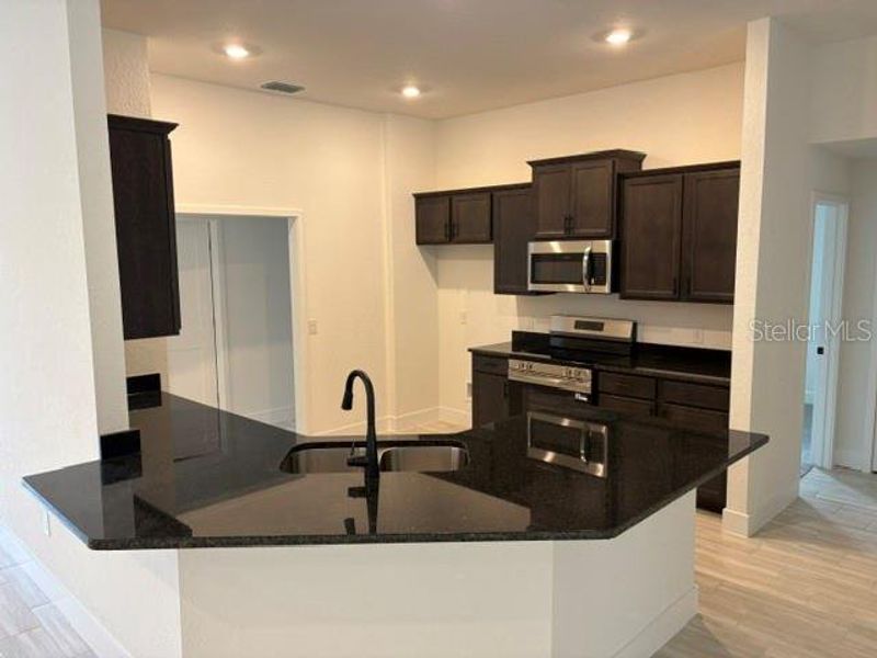 Furnished interior view inside a new home in Juliette Falls, Dunnellon (Image 6).