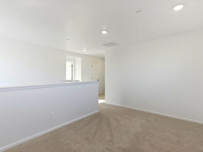 Spacious, unfurnished interior of a new home in Buffalo Highlands: The Flora Collection, Commerce City (Image 15).