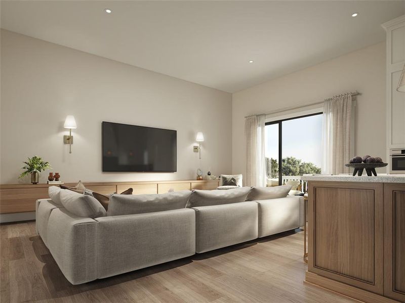 View of your living room for the kitchen. Note the sliding glass doors leading out to your balcony, just steps from your backyard!