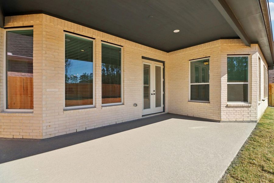 Exterior details and patio area of a home in The Highlands, Porter (Image 19).