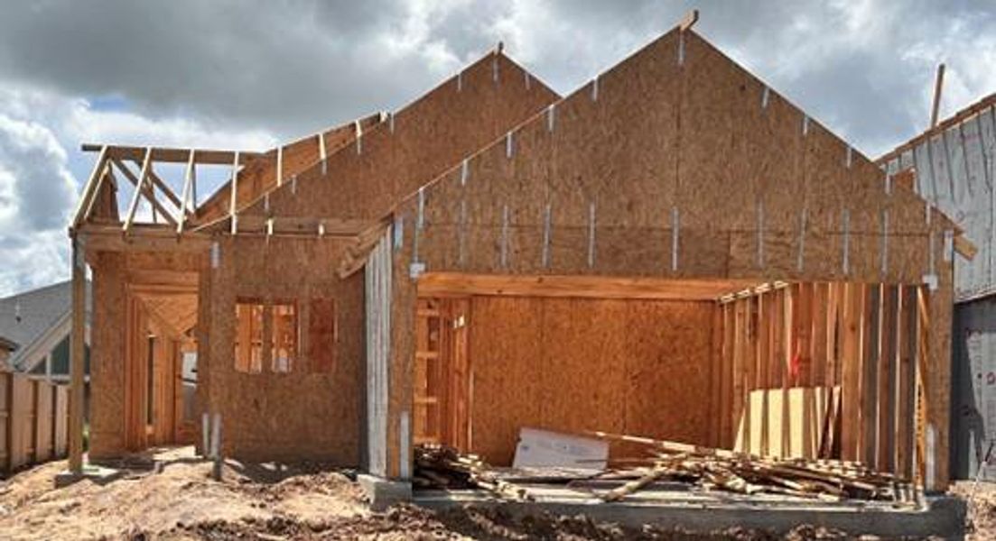 Front exterior of a new home in Meridiana 40', 65', Iowa Colony, TX, highlighting curb appeal (Image 1). Front exterior of a new home in Meridiana 40', 65', Iowa Colony, TX, highlighting curb appeal (Image 1).