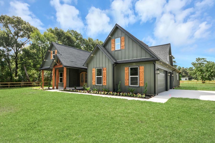 Front exterior of a new home in , Plantersville, TX, highlighting curb appeal (Image 27). Front exterior of a new home in , Plantersville, TX, highlighting curb appeal (Image 27).