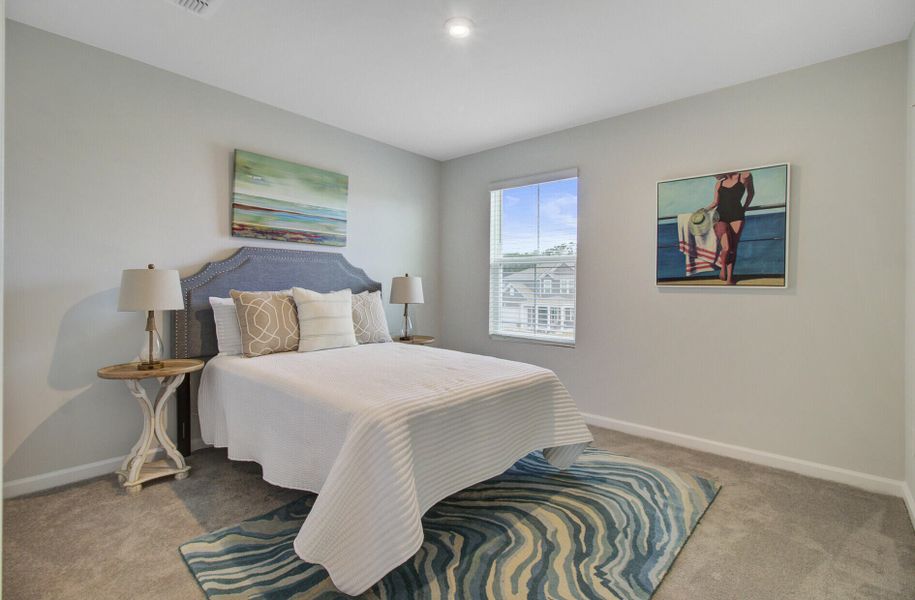 Furnished interior view inside a new home in Sanctuary Cove at Cane Bay, Summerville (Image 32).