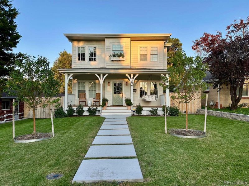 Front exterior of a new home in , Wheat Ridge, CO, highlighting curb appeal (Image 1). Front exterior of a new home in , Wheat Ridge, CO, highlighting curb appeal (Image 1).
