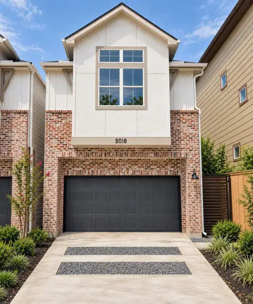 Front exterior of a new home in Schuler Point in Rice Military, Houston, TX, highlighting curb appeal (Image 1). Front exterior of a new home in Schuler Point in Rice Military, Houston, TX, highlighting curb appeal (Image 1).