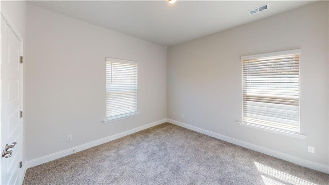 Spacious, unfurnished interior of a new home in Holliday Pass, Griffin (Image 13).