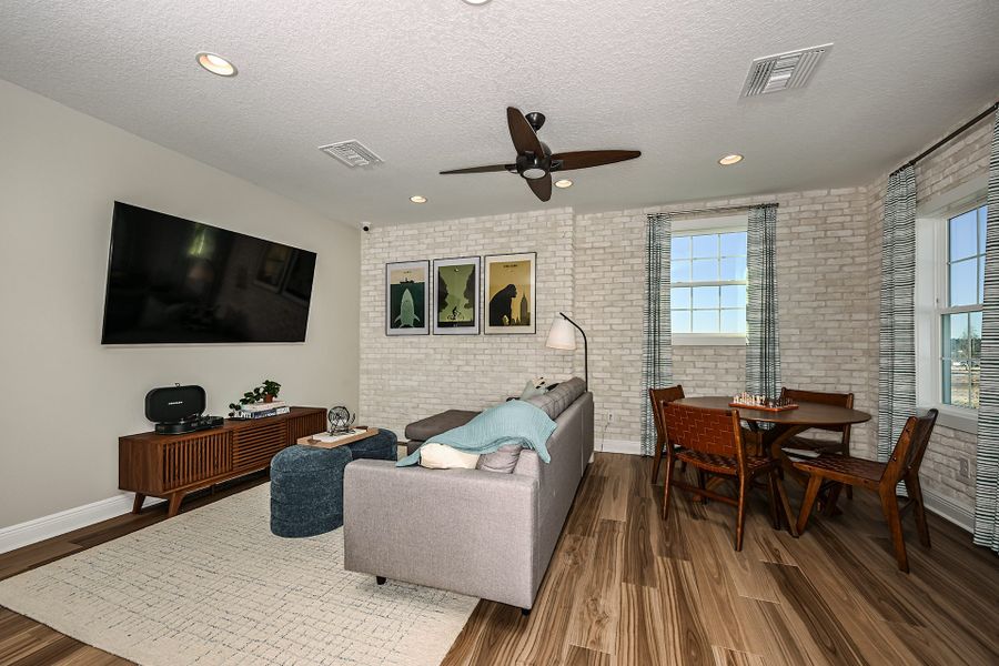 Representative furnished interior of a home built from the Biscayne II by Homes by WestBay in Oakfield, Parrish (Image 6).