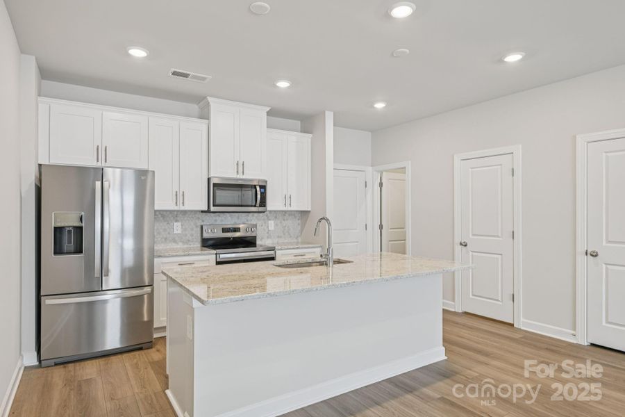 Furnished interior view inside a new home in , Mooresville (Image 6).