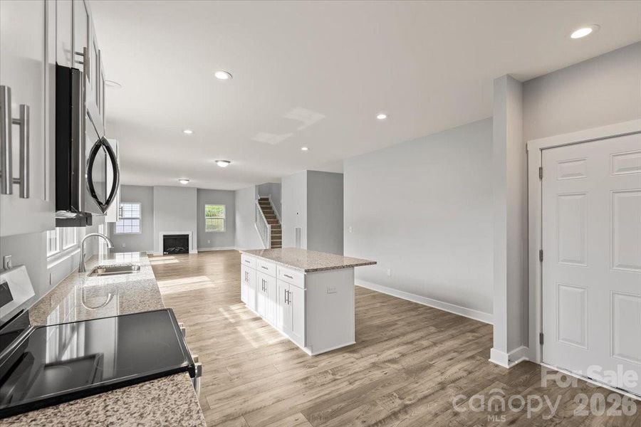 Furnished interior view inside a new home in , Monroe (Image 13).