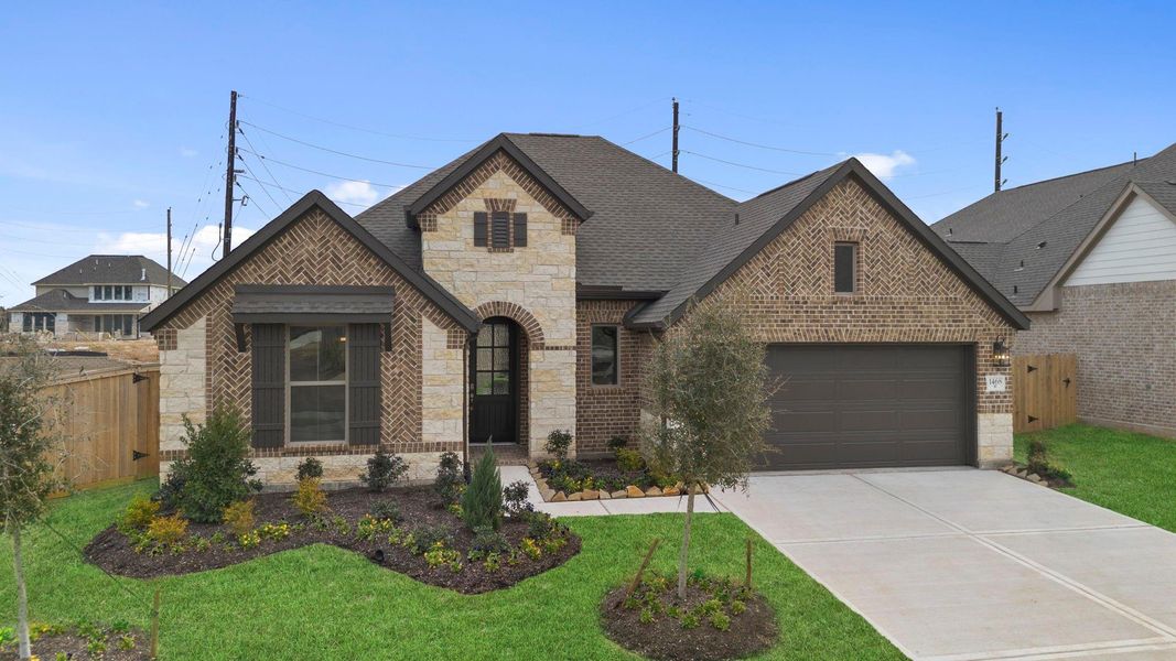 Front exterior of a new home in Escondido, Magnolia, TX, highlighting curb appeal (Image 22). Front exterior of a new home in Escondido, Magnolia, TX, highlighting curb appeal (Image 22).