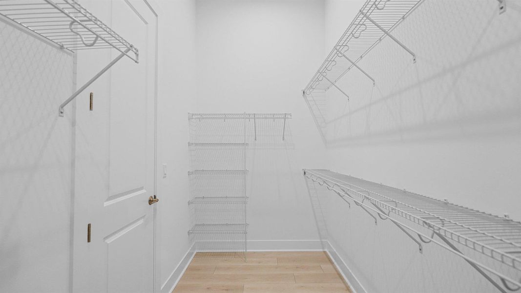 Furnished interior view inside a new home in L'Ambiance at Avenir, Palm Beach Gardens (Image 24). Furnished interior view inside a new home in L'Ambiance at Avenir, Palm Beach Gardens (Image 24).