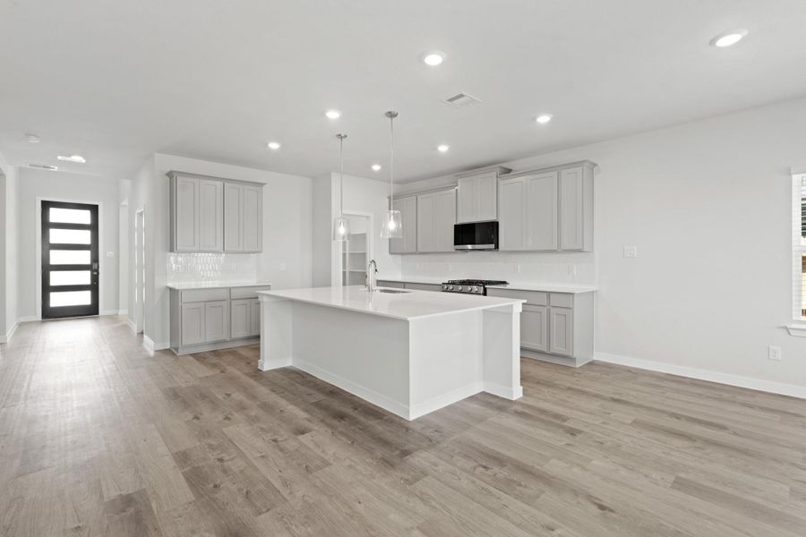 Furnished interior view inside a new home in Sunterra Lakes, Brookshire (Image 7).