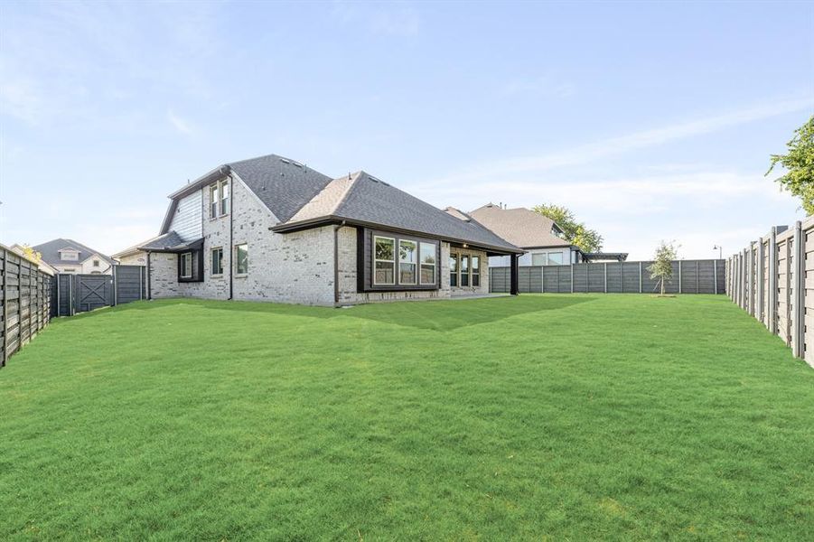 Front exterior of a new home in Union Park Classic 60, Little Elm, TX, highlighting curb appeal (Image 23). Front exterior of a new home in Union Park Classic 60, Little Elm, TX, highlighting curb appeal (Image 23).
