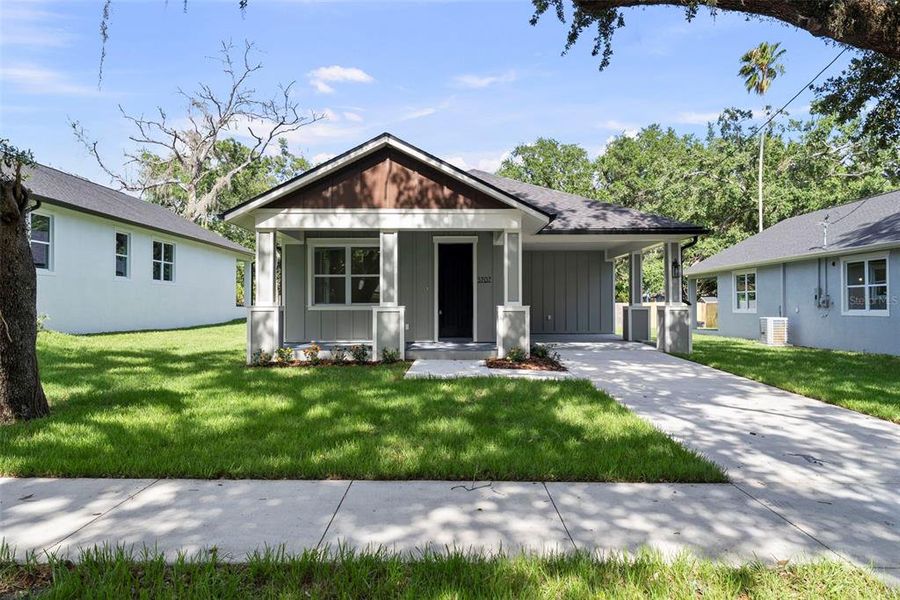 Front exterior of a new home in , Tampa, FL, highlighting curb appeal (Image 21). Front exterior of a new home in , Tampa, FL, highlighting curb appeal (Image 21).
