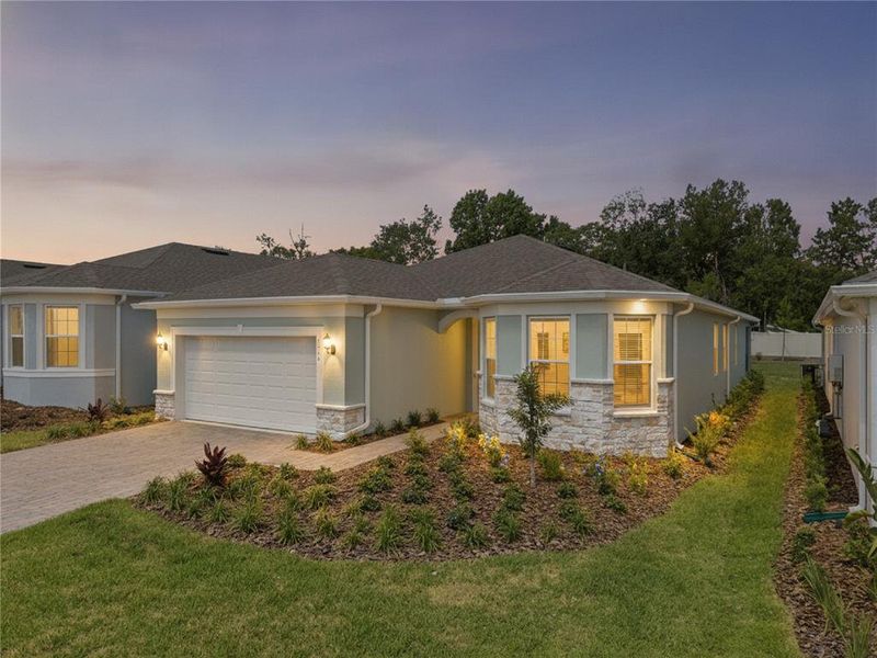 Front exterior of a new home in , Minneola, FL, highlighting curb appeal (Image 2). Front exterior of a new home in , Minneola, FL, highlighting curb appeal (Image 2).