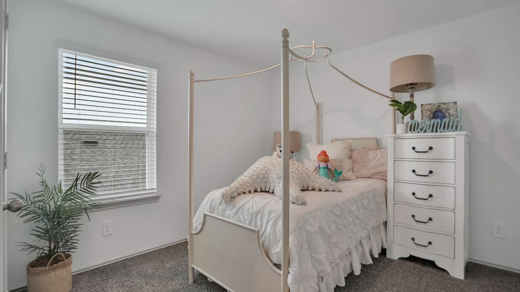 Representative furnished interior of a home built from the MITCHELL by D.R. Horton in Westward Pointe, Sealy (Image 18).