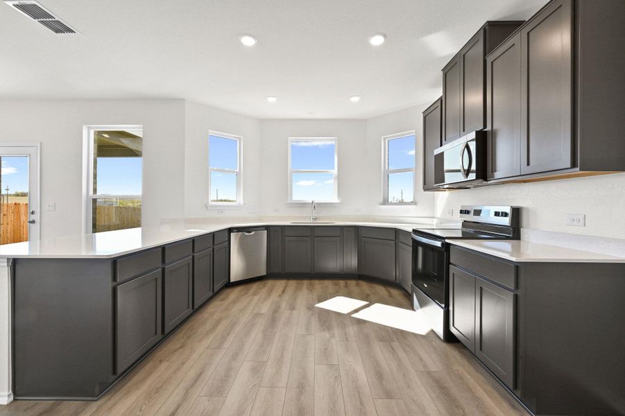 Furnished interior view inside a new home in Stoney Chase, Del Valle (Image 7).