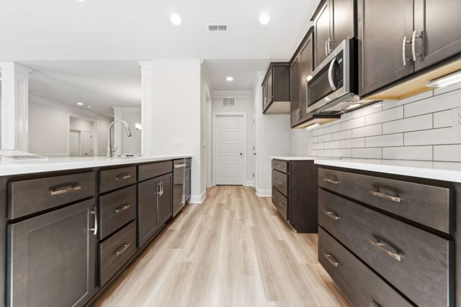 Furnished interior view inside a new home in Weybridge, Burlington (Image 8).