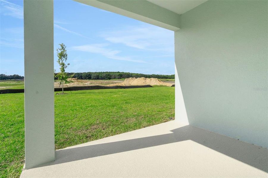 Exterior details and patio area of a home in Reserve at Hammock Oaks, Lady Lake (Image 18).