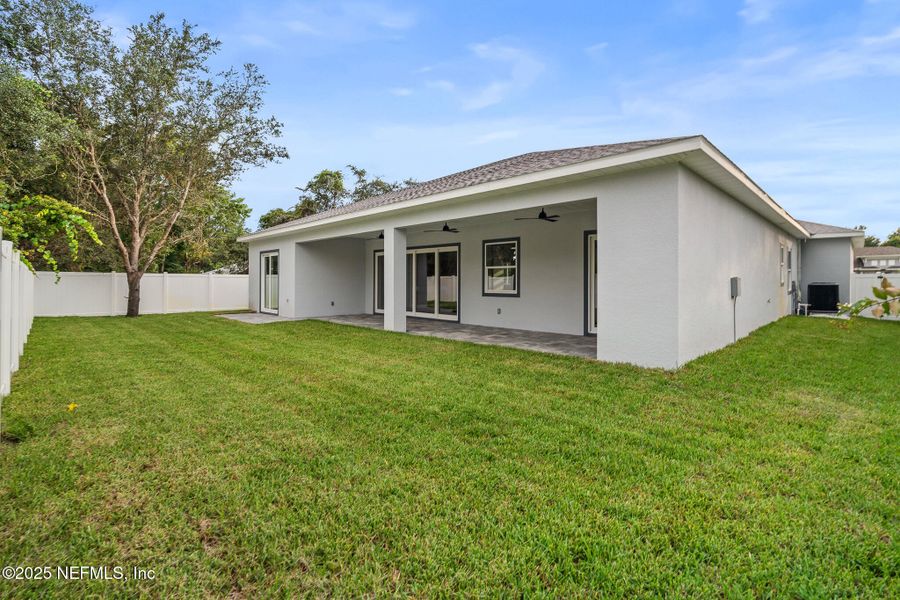 Front exterior of a new home in , Palm Coast, FL, highlighting curb appeal (Image 42). Front exterior of a new home in , Palm Coast, FL, highlighting curb appeal (Image 42).