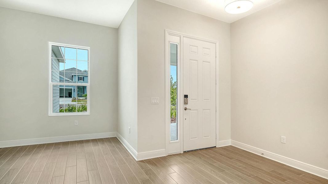 Spacious, unfurnished interior of a new home in Canoe Creek Real Estate and Homes for Sale in Parrish, FL - Neal Communities, Parrish (Image 49).