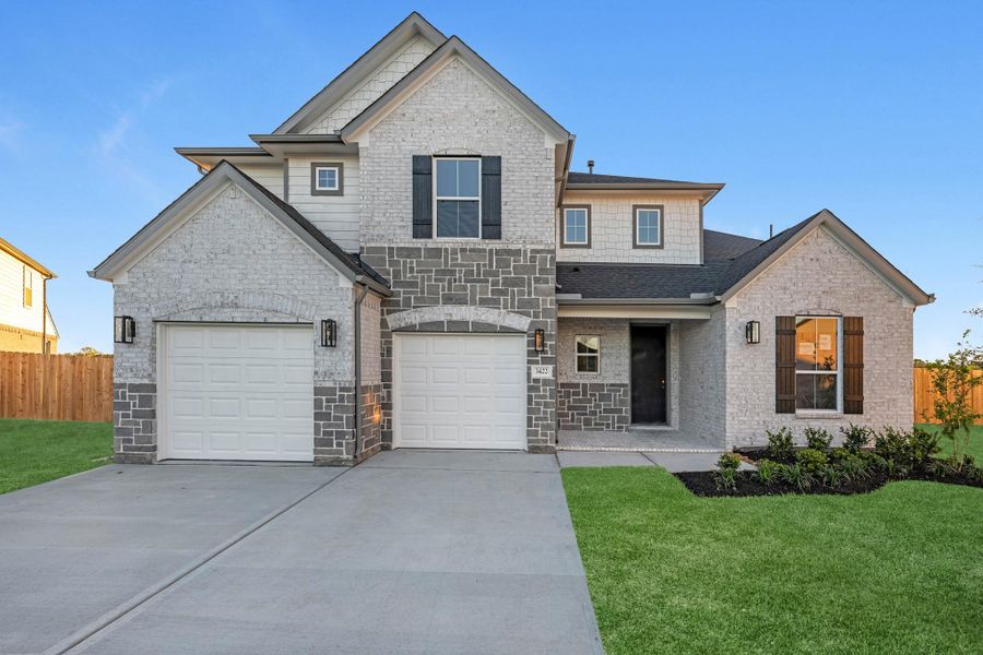 Front exterior of a new home in Briarwood Crossing, Rosenberg, TX, highlighting curb appeal (Image 25).