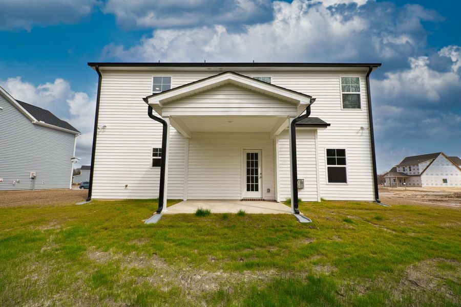 Representative exterior photo of a completed home built from the Meadowbrook by Caviness & Cates Communities in Sutherland Station at Olde Liberty, Franklinton, NC (Image 222). Representative exterior photo of a completed home built from the Meadowbrook by Caviness & Cates Communities in Sutherland Station at Olde Liberty, Franklinton, NC (Image 222).