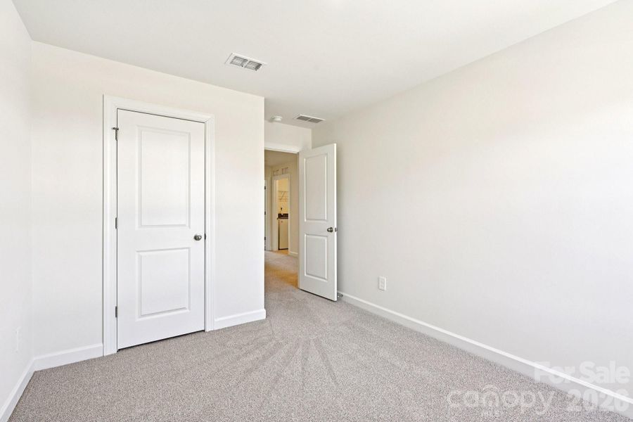 Spacious, unfurnished interior of a new home in Meadows at Wilson Farms - The Summit Series, Fort Mill (Image 14). Spacious, unfurnished interior of a new home in Meadows at Wilson Farms - The Summit Series, Fort Mill (Image 14).