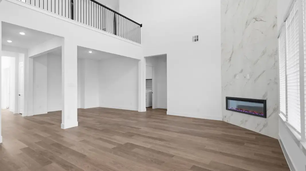 Representative unfurnished interior of a home built from the Adrian by D.R. Horton in Alexander 65' Homesites, Pearland (Image 22).