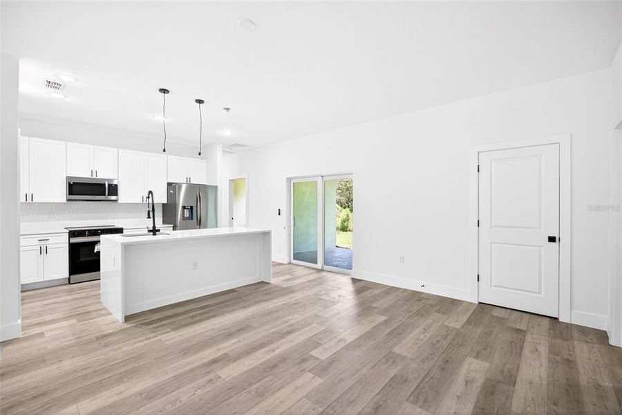 Spacious, unfurnished interior of a new home in , Port Charlotte (Image 32).