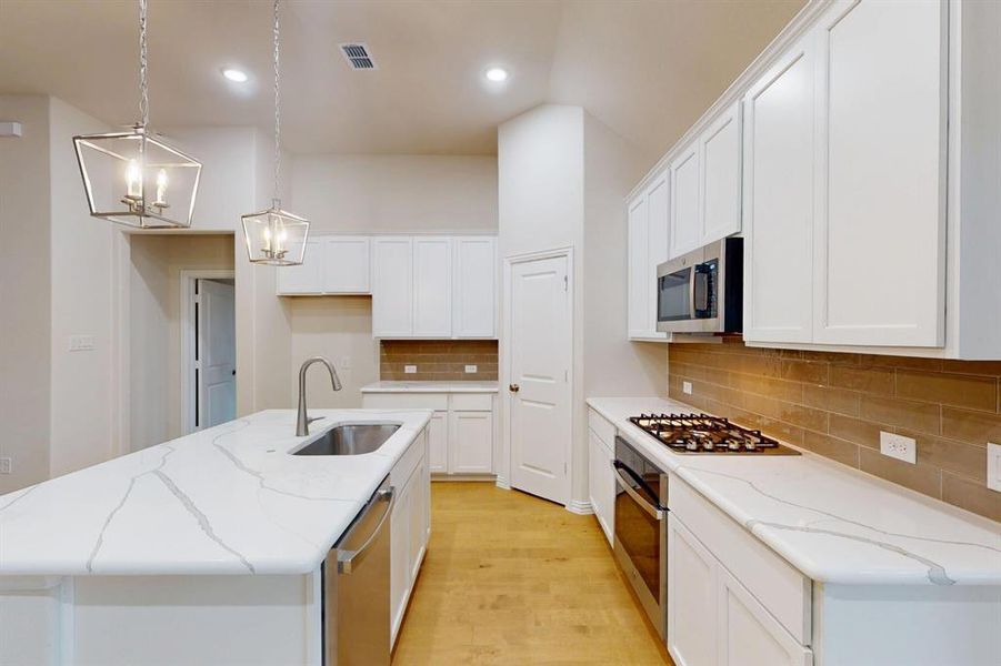 Furnished interior view inside a new home in Lilybrooke at Legacy Hills, Celina (Image 10). Furnished interior view inside a new home in Lilybrooke at Legacy Hills, Celina (Image 10).