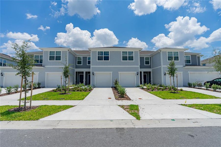 Front exterior of a new home in , Kissimmee, FL, highlighting curb appeal (Image 16). Front exterior of a new home in , Kissimmee, FL, highlighting curb appeal (Image 16).