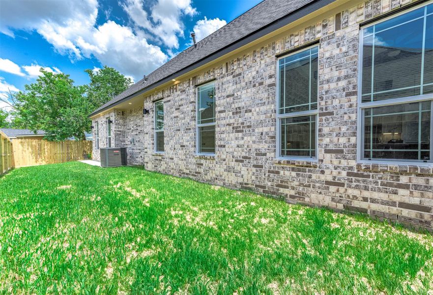 Front exterior of a new home in , Needville, TX, highlighting curb appeal (Image 26). Front exterior of a new home in , Needville, TX, highlighting curb appeal (Image 26).