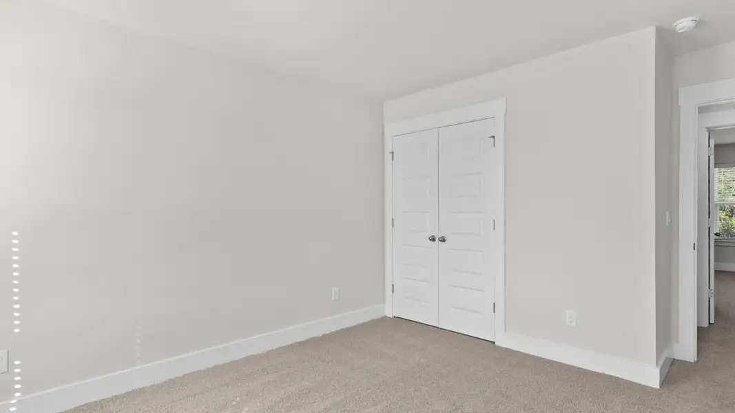 Spacious, unfurnished interior of a new home in The Highlands at Cedar Hill Landing, Navassa (Image 30).